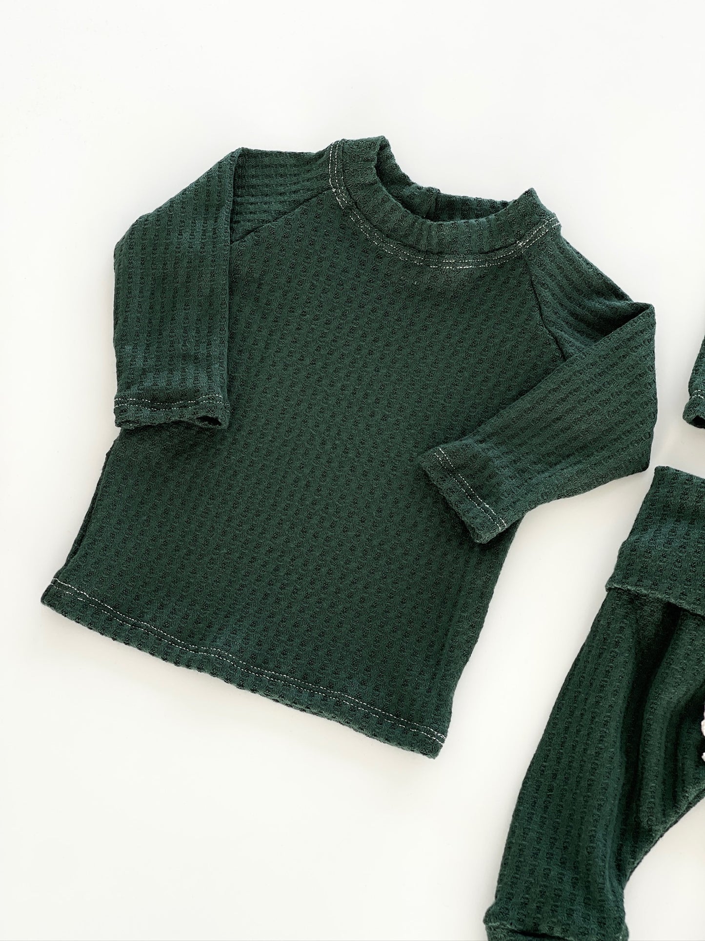 green waffle knit baby Christmas pajamas