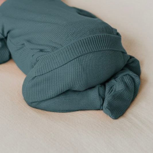 teal back flap footie outfit for babies