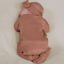 Load image into Gallery viewer, Muted pink baby girl footie pajamas, soft waffle knit baby one-piece outfit.