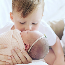 Load image into Gallery viewer, pink waffle newborn girl swaddle