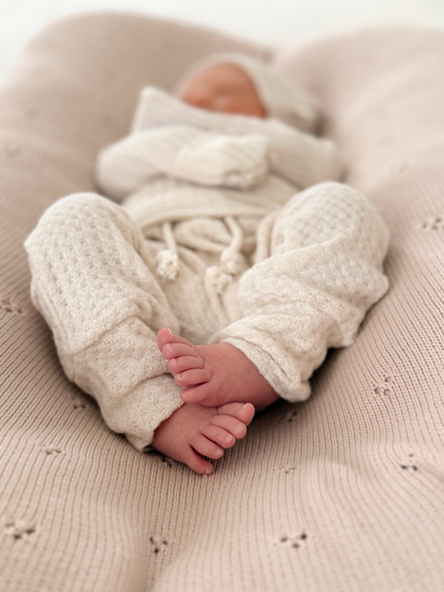 Minimal cream newborn layette set in premium waffle knit