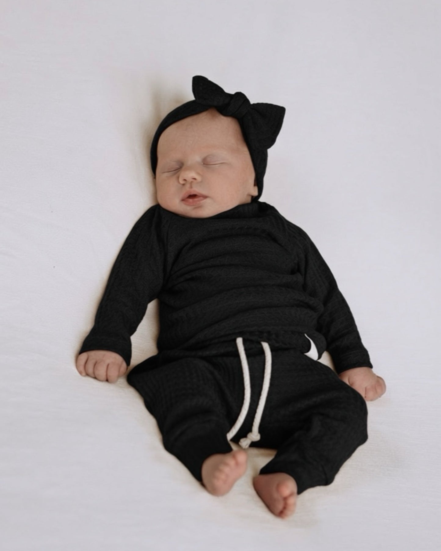 Bold newborn photo outfit in black