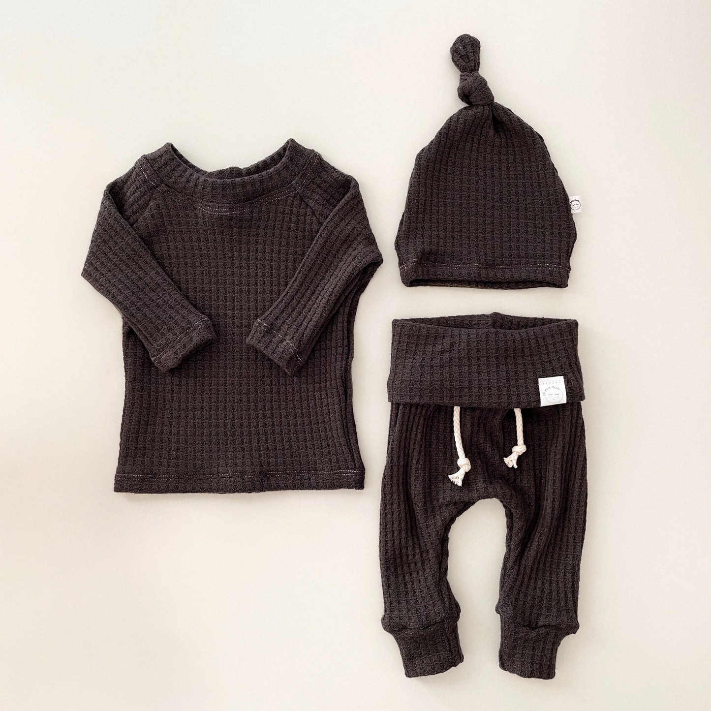 Black waffle knit neutral newborn coming home outfit