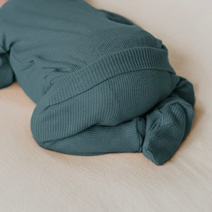 teal back flap footie outfit for babies