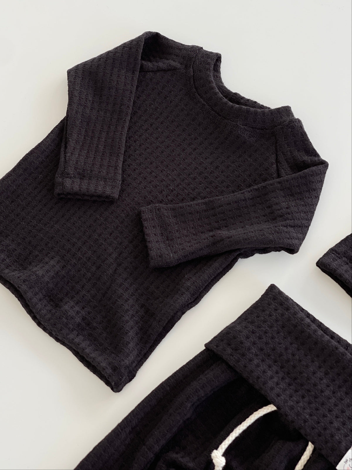 Minimal black newborn layette set