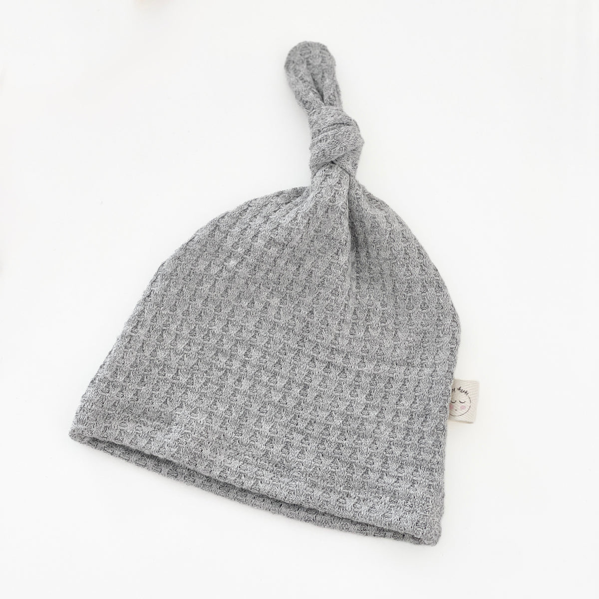 light gray waffle knit knotted hat