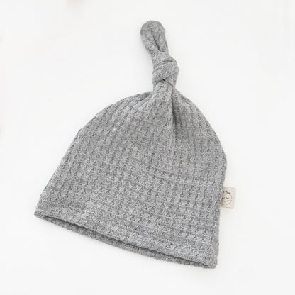 light gray waffle knit knotted hat
