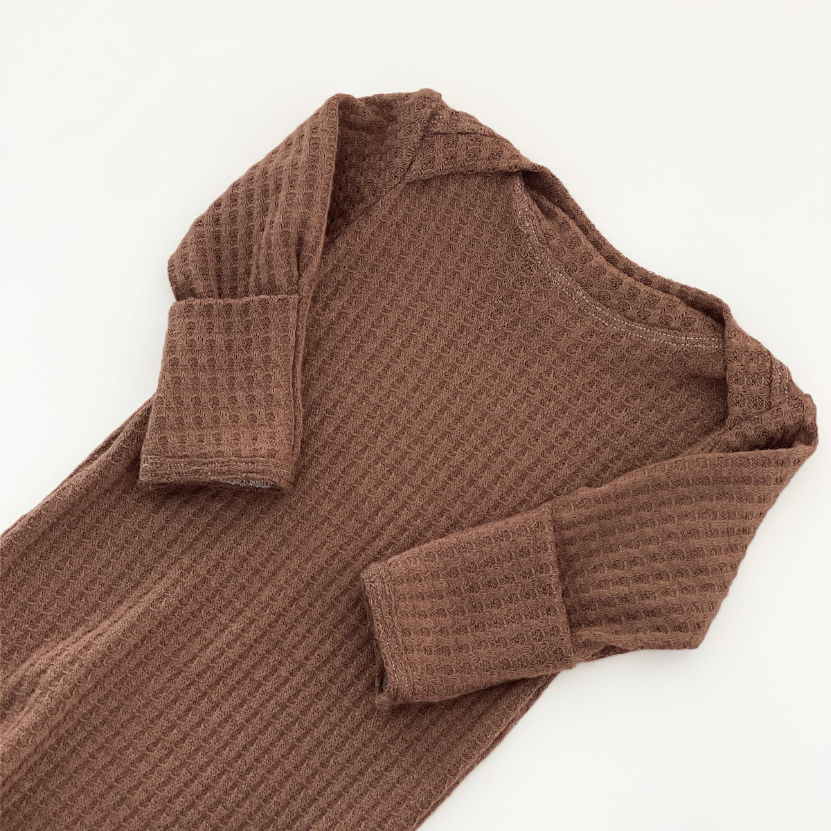 A brown waffle-knit long-sleeve gown 