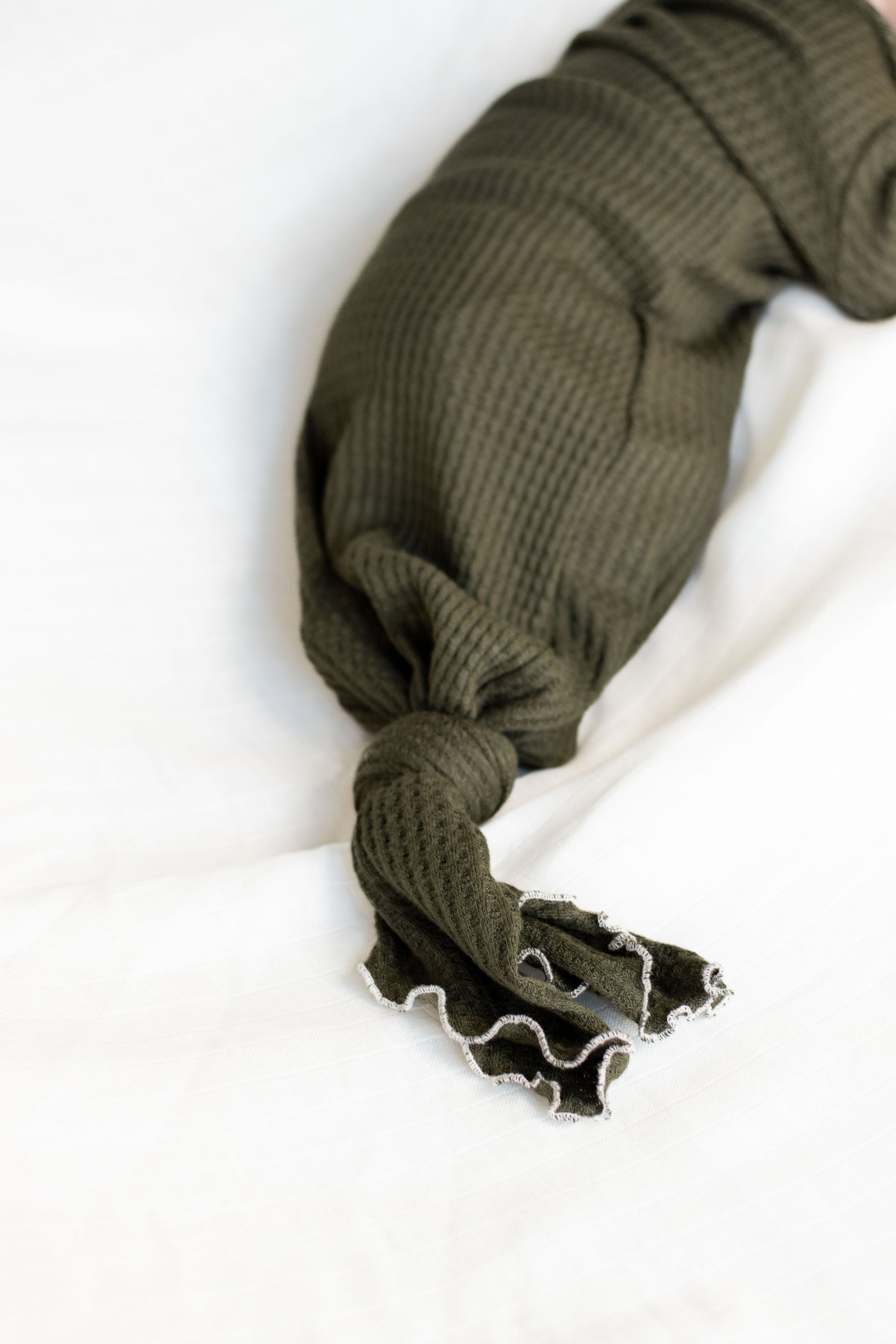 green newborn baby gown