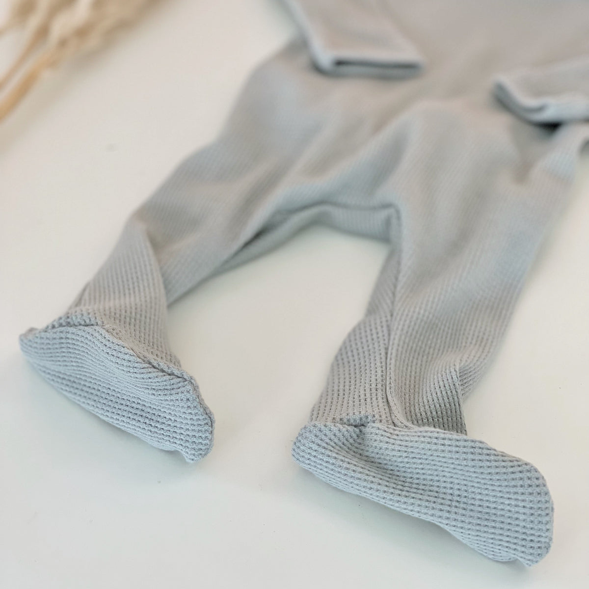 baby boy waffle knit footie pajamas in blue