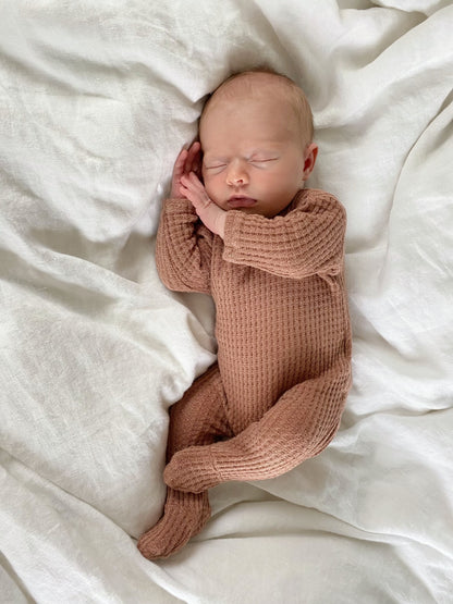 cute baby girl one piece footie pajamas, soft and comfortable infant clothing.