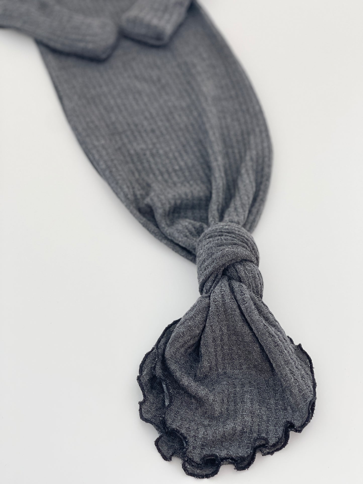 Newborn tied knotted gown