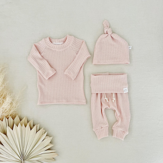 Blush pink waffle knit take-home outfit for newborn girls