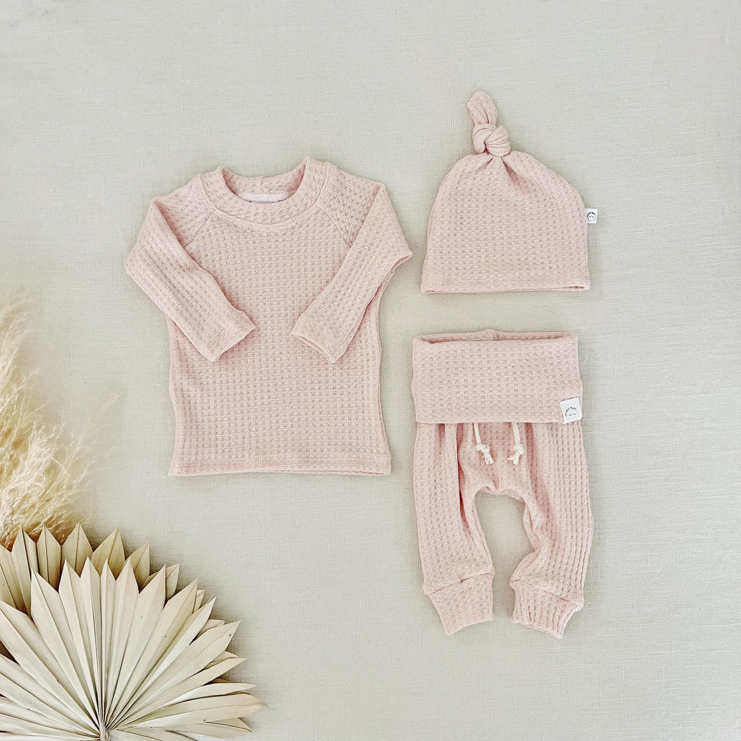 Blush pink waffle knit take-home outfit for newborn girls