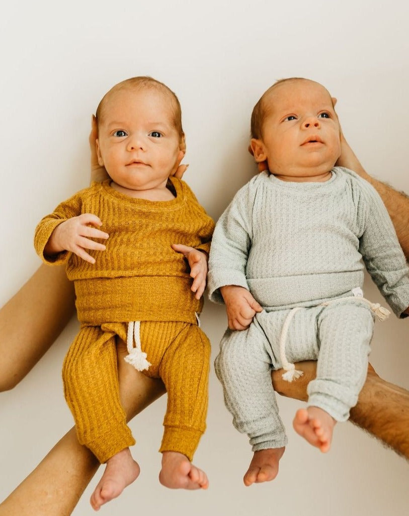 Golden mustard baby outfit, modern knit romper for milestone photos