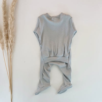 mint blue baby boy pajamas with a back flap for easy diaper changing.