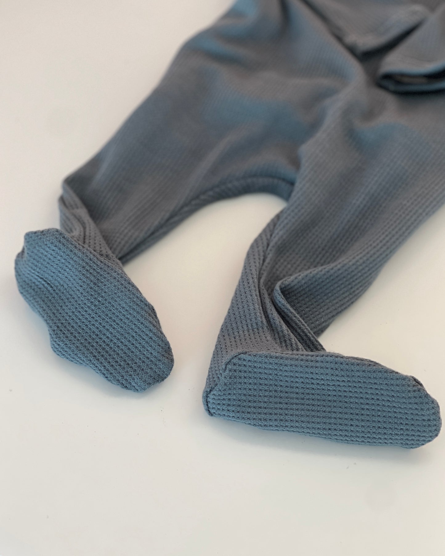 Newborn baby boy footie one piece outfit. Soft and comfy outfit for infants