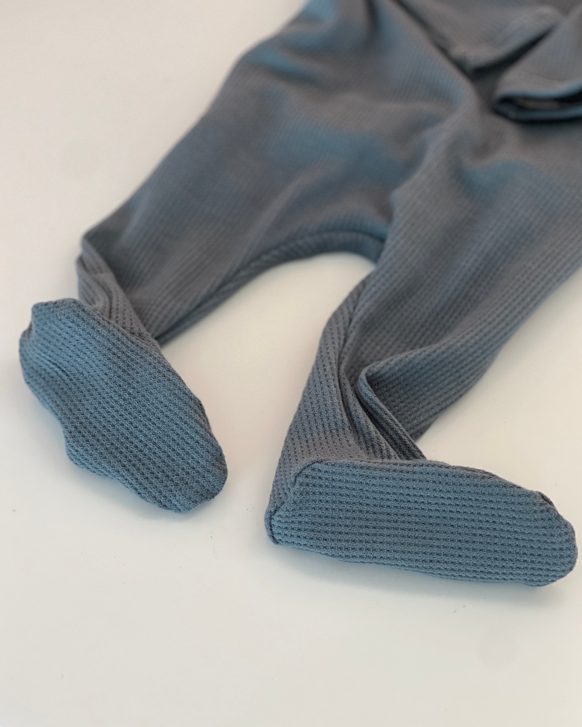 Newborn baby boy footie one piece outfit. Soft and comfy outfit for infants