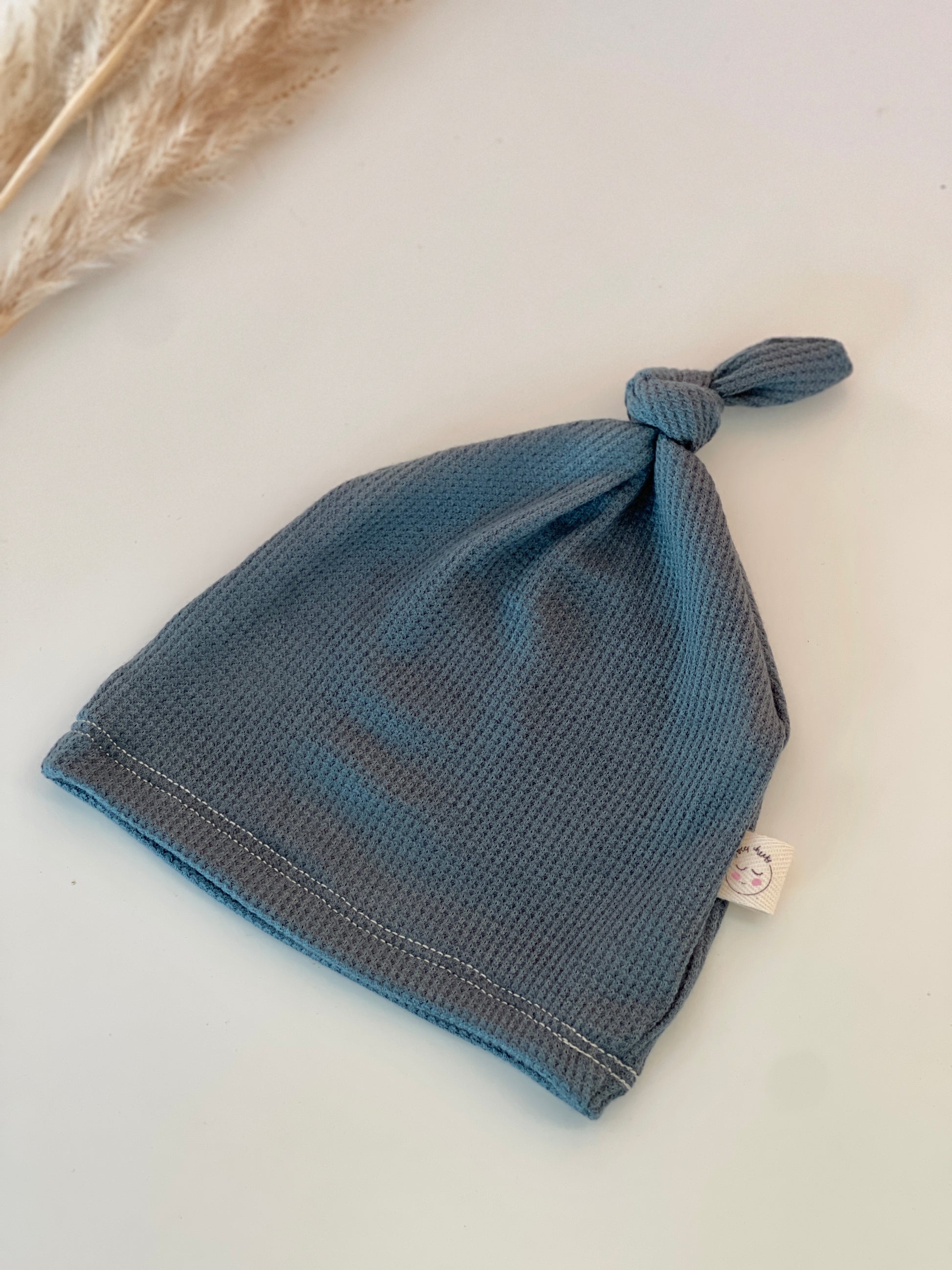 teal blue thermal waffle knit hat for baby boys.